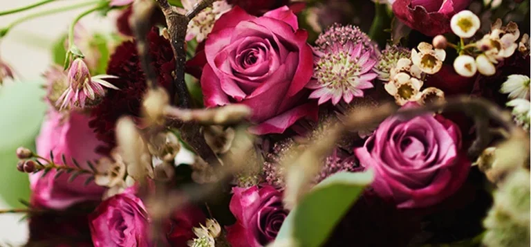 Feir mamma med blomster på morsdagen 